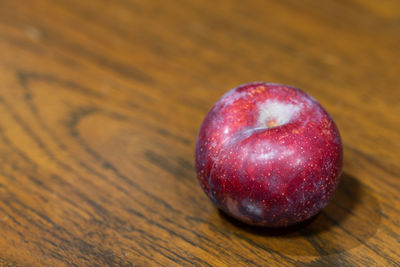 Close-up of apple on table
