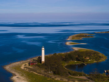 High angle view of sea against blue sky