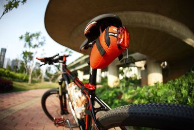 Close-up of bicycle on street in city