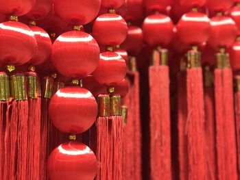 Close-up of lanterns hanging in row