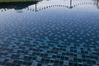 High angle view of swimming pool against building