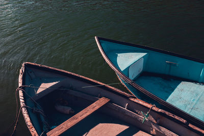 High angle view of fishing boat moored in lake