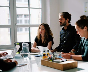 View of people in office meeting