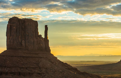 Scenic view of dramatic sky over landscape