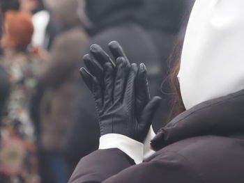 Close-up of man holding hands