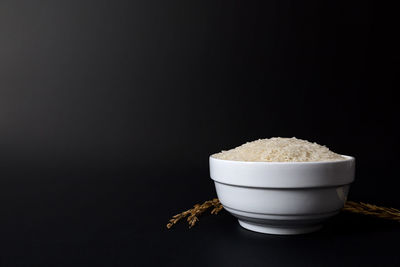 Close-up of breakfast against black background