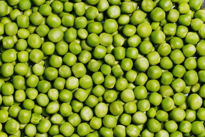 Green peas texture. abstract wallpaper. peas kept in abundance for sale in the market.