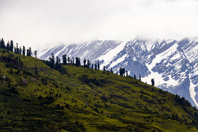 Scenic view of mountains against sky during winter