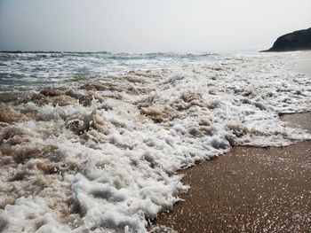 Scenic view of sea against clear sky
