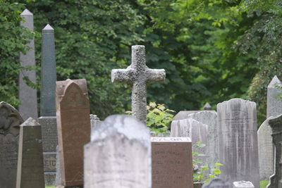 Stone cross in cemetery