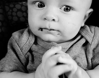 Close-up of cute baby at home