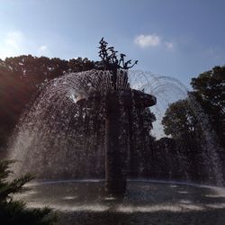 Low angle view of fountain against sky