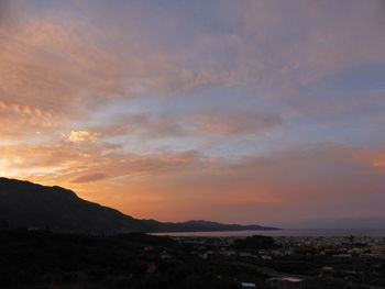 Scenic view of landscape against sky during sunset