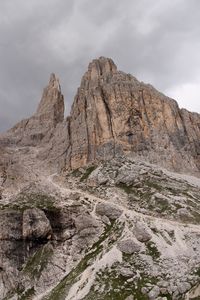 Low angle view of rock formation against sky