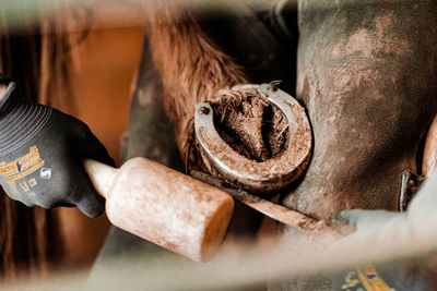 Man holding hoof
