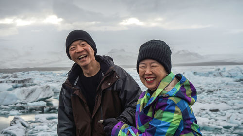 Portrait of smiling couple during winter