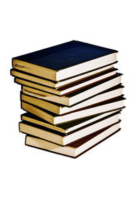 Stack of books against white background