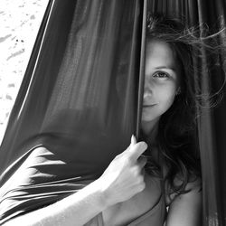 Portrait of woman in window