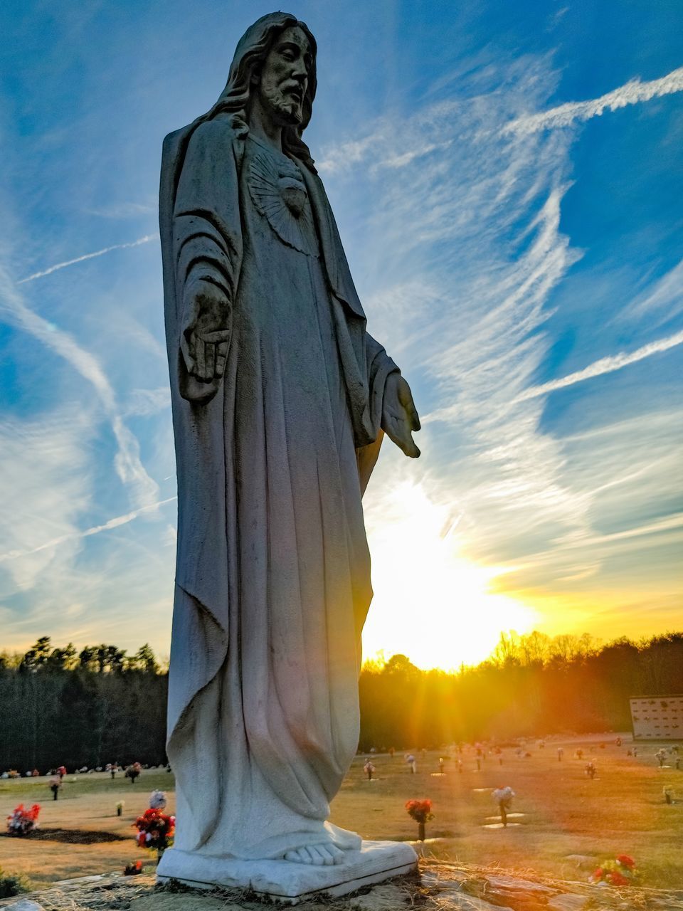 STATUE OF ANGEL DURING SUNSET