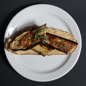 High angle view of fish in plate on table