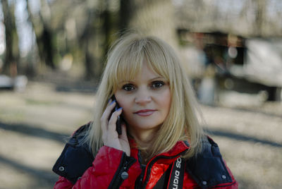 Portrait of woman using smart phone