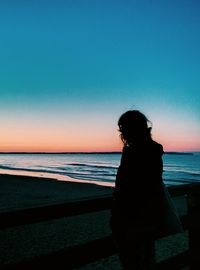 Scenic view of sea at sunset