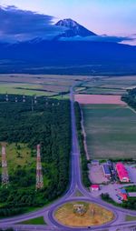 High angle view of road by landscape against sky