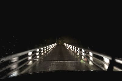 View of illuminated bridge at night