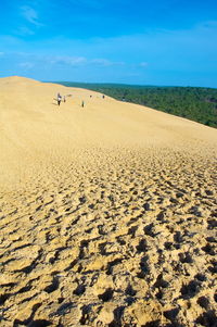 Scenic view of desert against sky