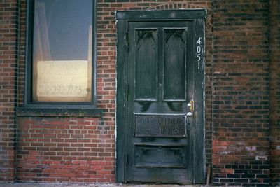 Close-up of window on brick wall