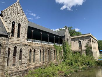 Low angle view of old building against sky