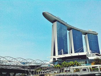 Low angle view of built structure against clear blue sky