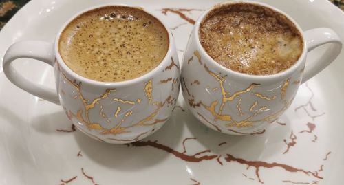 Close-up of cappuccino on table