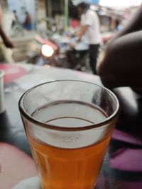 Close-up of beer glass on table