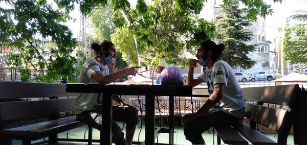 People sitting on table in restaurant