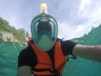 Man scuba diving in sea