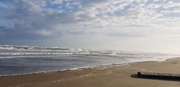 Scenic view of beach against sky