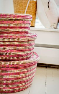 Close-up of basket stacked on floor