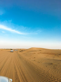 Scenic view of desert against sky