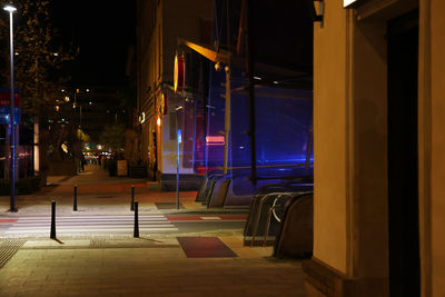 Illuminated street at night