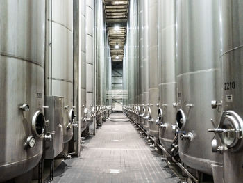 Aisle along stainless steel tanks