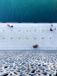 High angle view of people on swimming pool