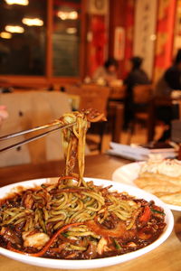 Close up of jajangmyeon, korean black bean sauce noodles at korean restaurant, busan, south korea