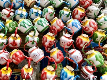 Full frame shot of multi colored teapots for sale at the market in al hafuf