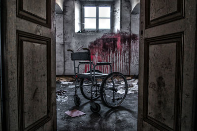 Wheelchair in abandoned building