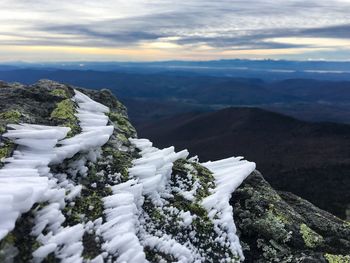 Scenic view of mountains against sky during winter