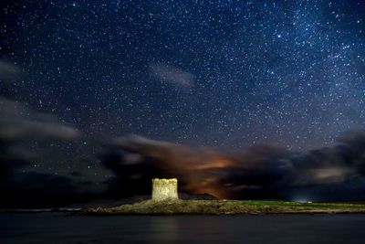 Scenic view of star field against sky at night