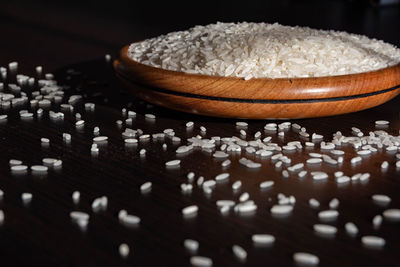 White rice on wooden bowl.