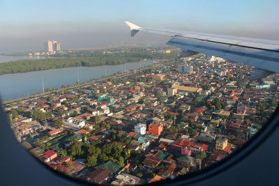 Aerial view of cityscape against sky