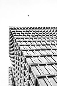 Low angle view of modern building against clear sky